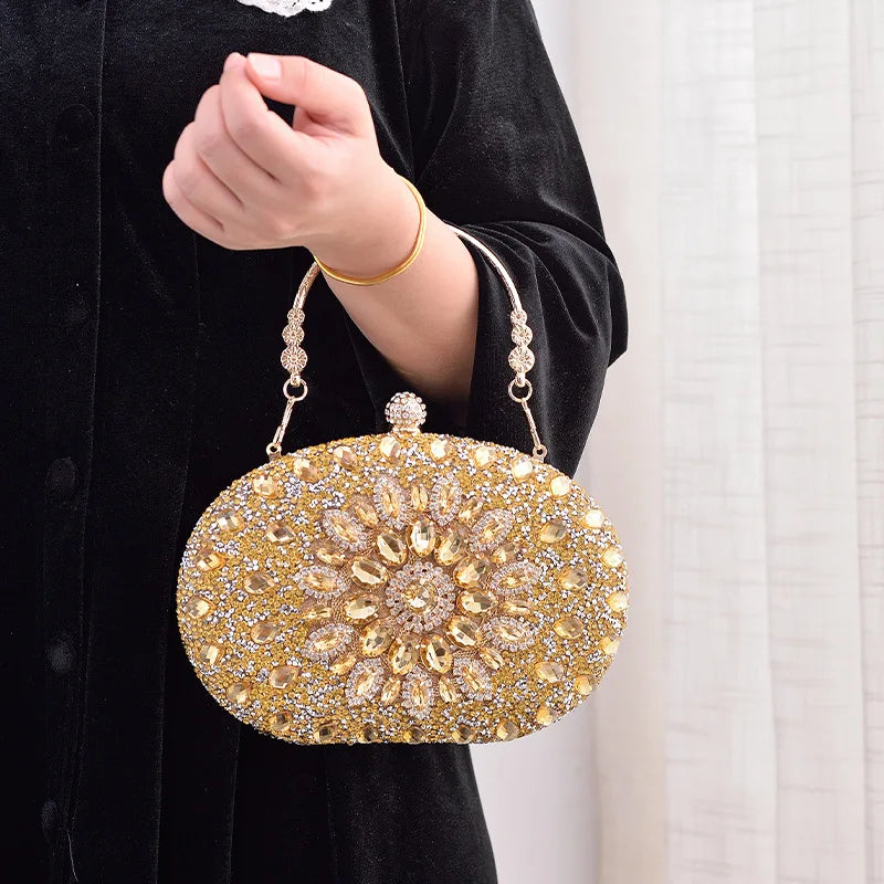 Sparkle at any event with our Flower Diamond Clutch. Luxury meets style with a metal handle and chain for added elegance