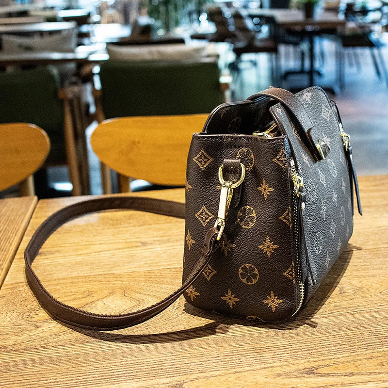 Experience luxury with our Designer Crossbody Shoulder Bag. Versatile and chic, perfect for travel or everyday elegance.