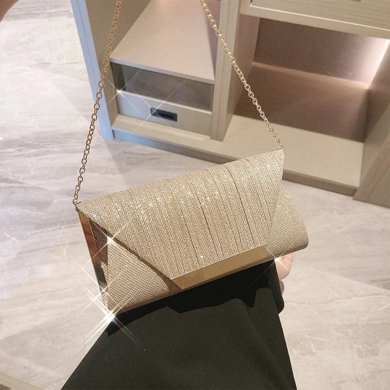 Elevate your evening with our Exquisite Glittering Bag. Perfect for any occasion, it adds elegance with a chain shoulder strap.